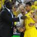 Michigan sophomore Trey Burke huddles with assistant coach Bacari Alexander and head coach John Beilein during the second half at Crisler Center on Sunday, March 10, 2013. Melanie Maxwell I AnnArbor.com